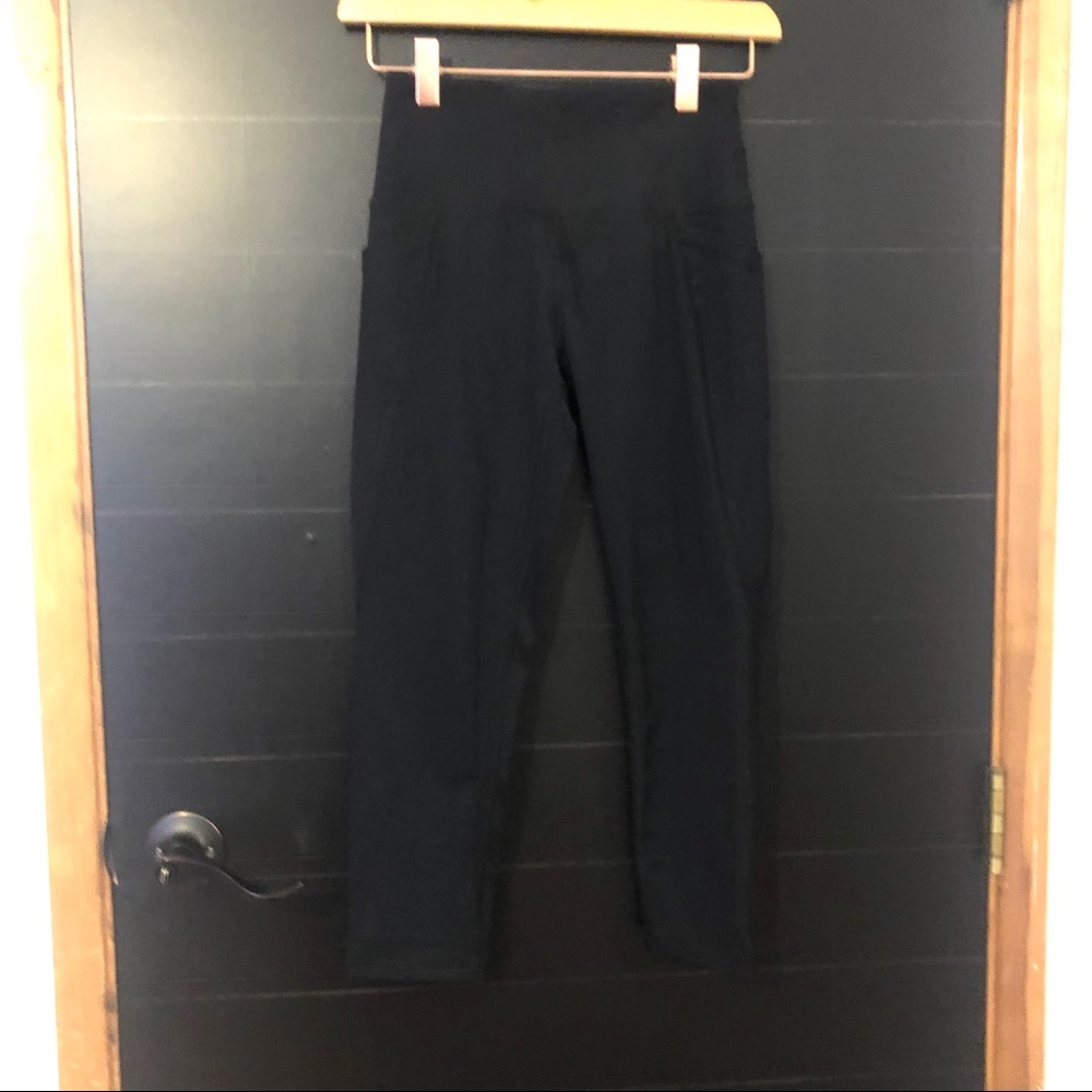 [x by gottex ] black leggings.